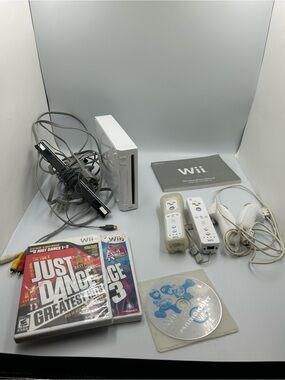 Nintendo RVL-101 Wii Console - (White) with controllers and games bundle
